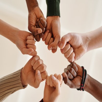 Unity and hands or fist for support