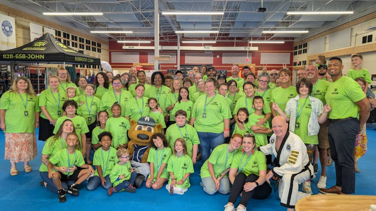 Backpack Giveaway by John McClung Roofing 2026 hosted at Sun Soo Martial Arts in Asheville