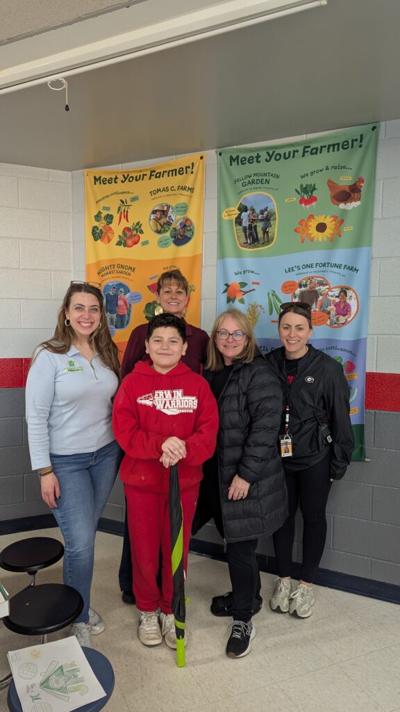 Winner of Pi Day Pizza Contest Johnston Elementary with John McClung Roofing Staff and Teachers