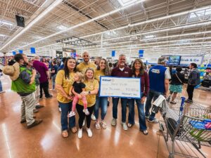 Shared Vision receiving $5,000 grant from local Walmart to help with John McClung Roofing Backpack Giveaway